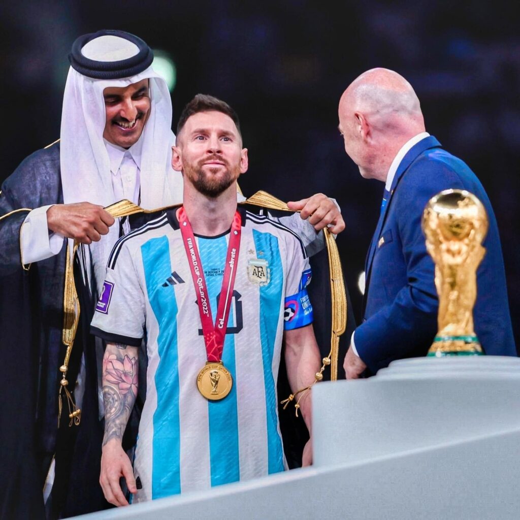 What was Lionel Messi wearing during World Cup trophy lift?